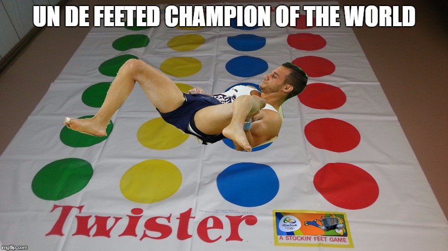 a true hero  | UN DE FEETED CHAMPION OF THE WORLD | image tagged in memes,2016 olympics,broken leg,rio,first world problems | made w/ Imgflip meme maker