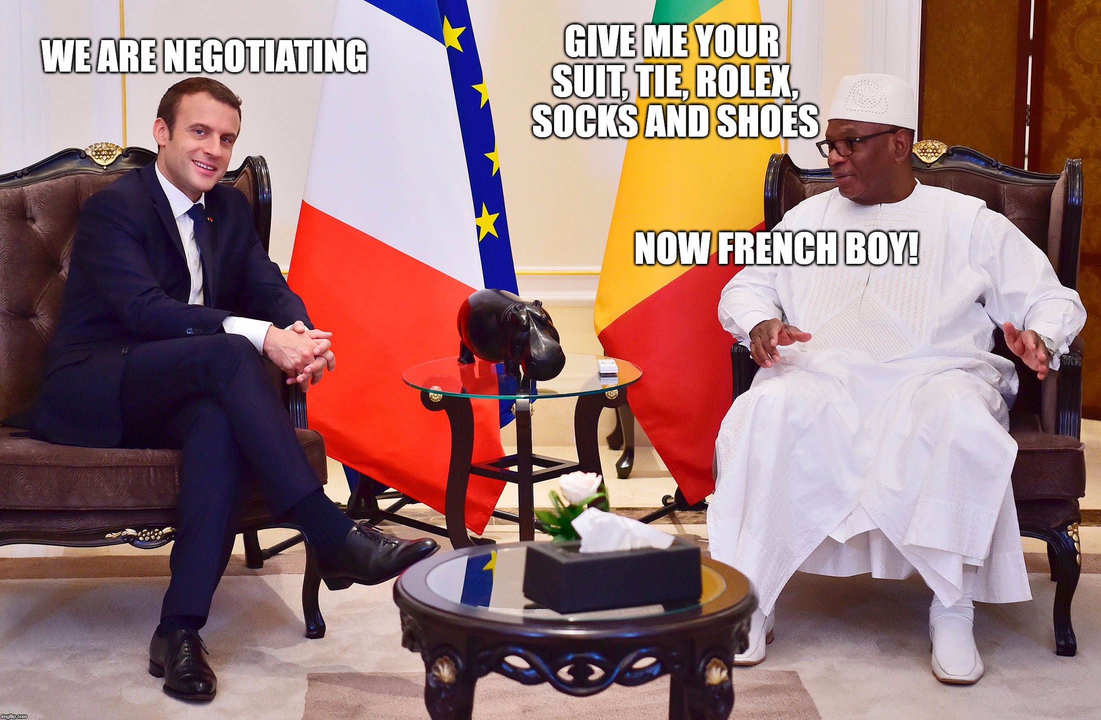 Macron's trade deal | WE ARE NEGOTIATING; GIVE ME YOUR SUIT, TIE, ROLEX, SOCKS AND SHOES; NOW FRENCH BOY! | image tagged in emmanuel macron | made w/ Imgflip meme maker