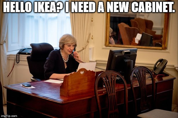 Theresa is in deep trouble. Half her cabinet has resigned over Brexit. | HELLO IKEA? I NEED A NEW CABINET. | image tagged in theresa may,phone | made w/ Imgflip meme maker