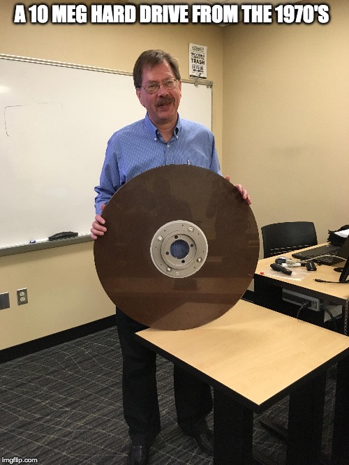 Technology has come a long way | A 10 MEG HARD DRIVE FROM THE 1970'S | image tagged in hard drive,old technology | made w/ Imgflip meme maker