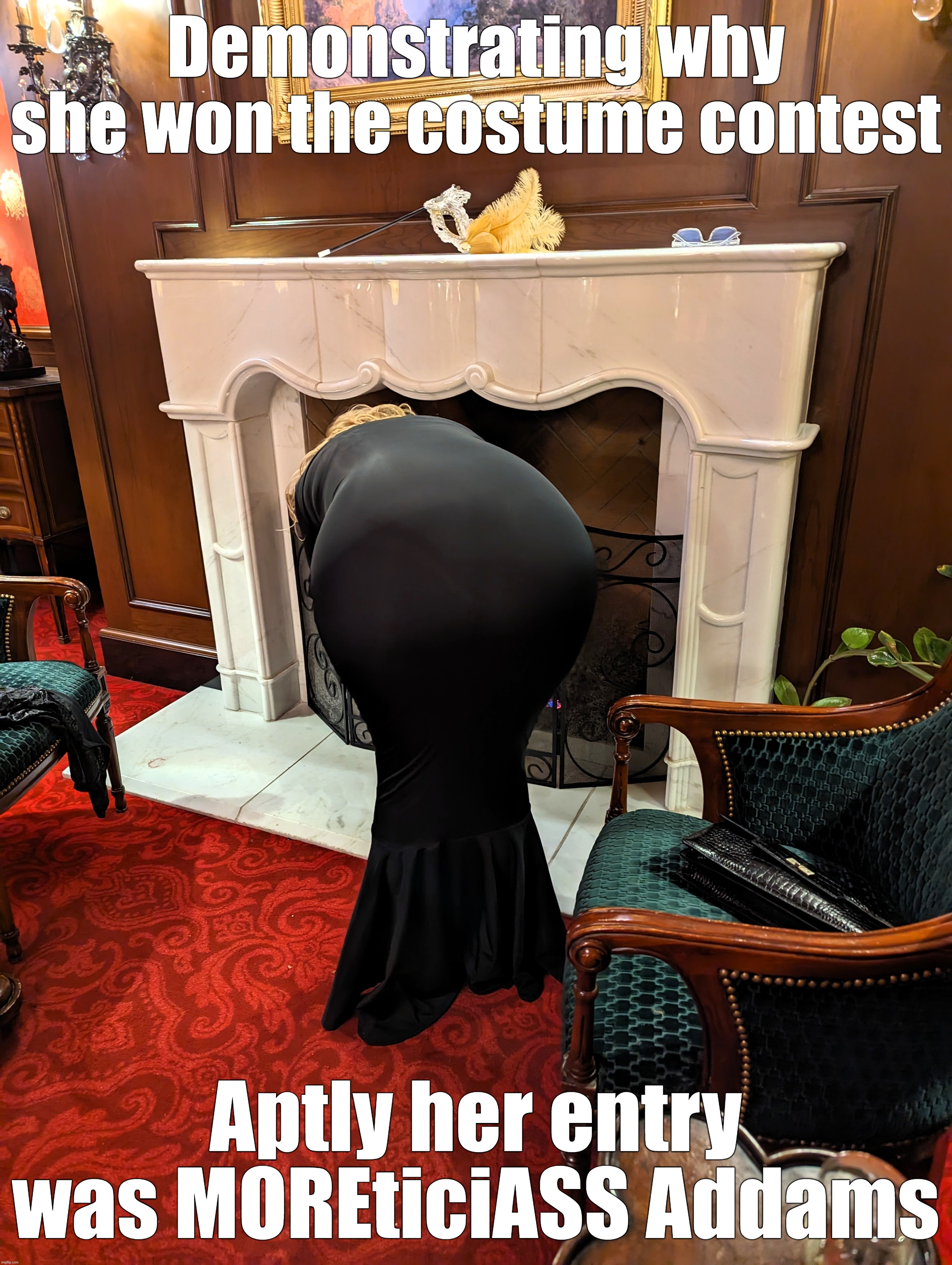 The Winning Costume | Demonstrating why she won the costume contest; Aptly her entry was MOREticiASS Addams | image tagged in tight dress,morticia addams,addams family,booty | made w/ Imgflip meme maker