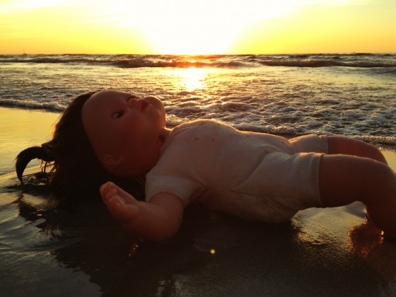 Baby doll on beach Blank Meme Template