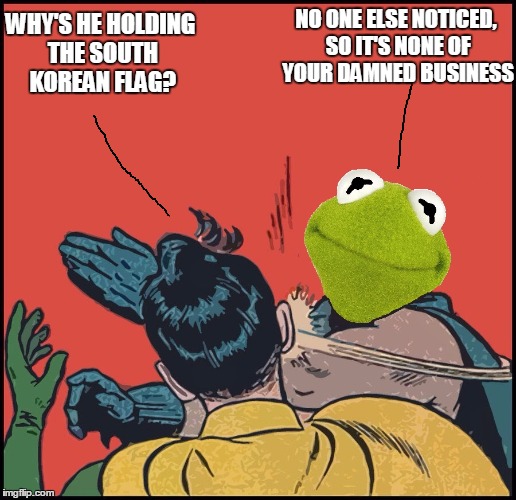 Kermit Slapping Robin | WHY'S HE HOLDING THE SOUTH KOREAN FLAG? NO ONE ELSE NOTICED, SO IT'S NONE OF YOUR DAMNED BUSINESS | image tagged in kermit slapping robin | made w/ Imgflip meme maker