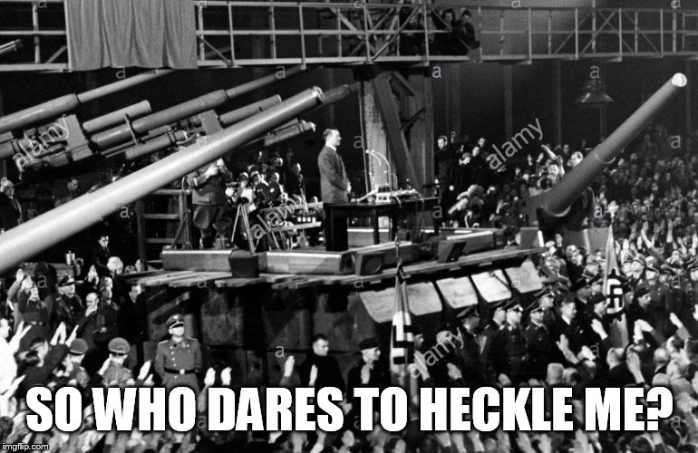 Hitler dangerous rally |  SO WHO DARES TO HECKLE ME? | image tagged in hitler | made w/ Imgflip meme maker