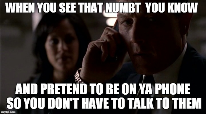Pretending to be on your phone | WHEN YOU SEE THAT NUMBT  YOU KNOW; AND PRETEND TO BE ON YA PHONE SO YOU DON'T HAVE TO TALK TO THEM | image tagged in phone,numbt,hate people,pretend to be on your phone,doggett | made w/ Imgflip meme maker