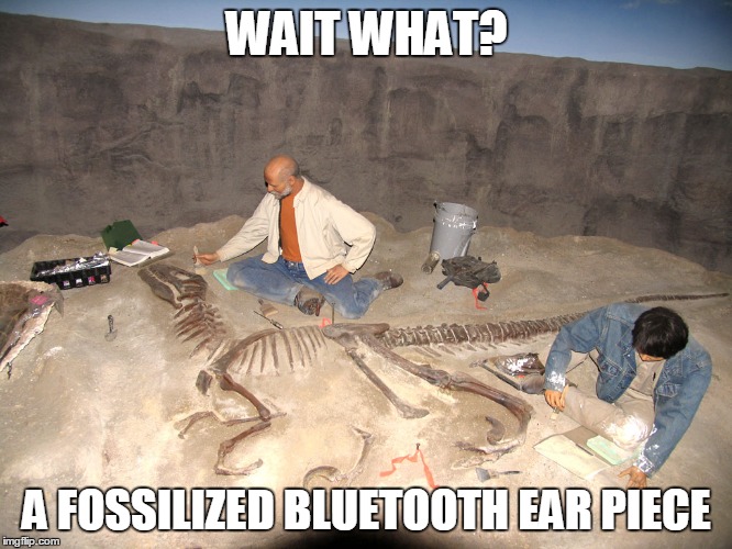 Calling Dr. Bakker! Check this out! | WAIT WHAT? A FOSSILIZED BLUETOOTH EAR PIECE | image tagged in fossilized philosoraptor,memes | made w/ Imgflip meme maker