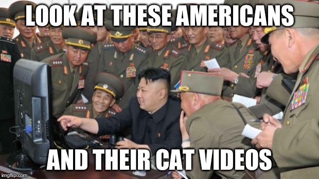 Kim Jung Un and the internet | LOOK AT THESE AMERICANS; AND THEIR CAT VIDEOS | image tagged in kim jung un and the internet | made w/ Imgflip meme maker