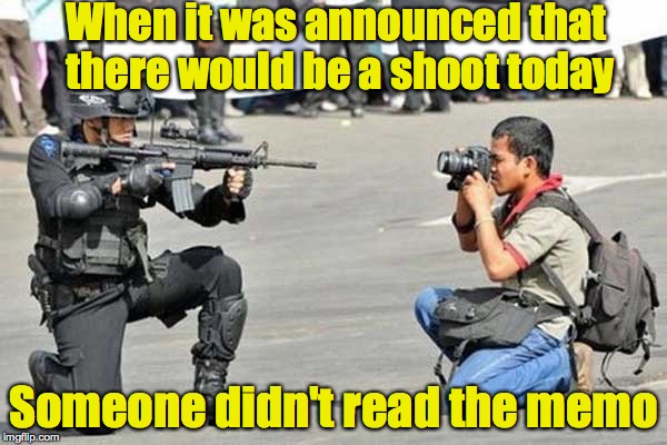 A picture may be worth a thousand words, but it's not worth a bullet | When it was announced that there would be a shoot today; Someone didn't read the memo | image tagged in camera,gun,shoot | made w/ Imgflip meme maker