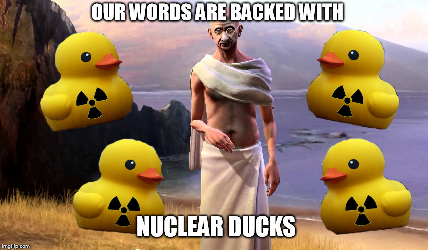 OUR WORDS ARE BACKED WITH; NUCLEAR DUCKS | image tagged in nuclear,ducks,gandhi | made w/ Imgflip meme maker