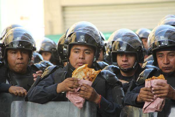 Mexican police on lunch eating Quesadillas Blank Meme Template