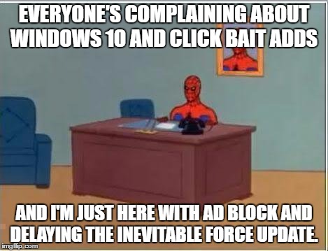 Spiderman Computer Desk | EVERYONE'S COMPLAINING ABOUT WINDOWS 10 AND CLICK BAIT ADDS; AND I'M JUST HERE WITH AD BLOCK AND DELAYING THE INEVITABLE FORCE UPDATE. | image tagged in memes,spiderman computer desk,spiderman | made w/ Imgflip meme maker