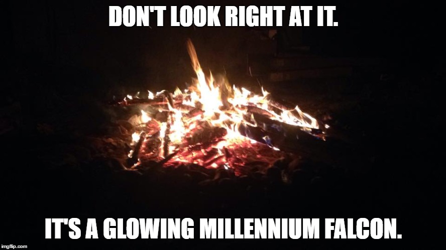 Burning Falcon. | DON'T LOOK RIGHT AT IT. IT'S A GLOWING MILLENNIUM FALCON. | image tagged in star wars,millennium falcon,fire | made w/ Imgflip meme maker
