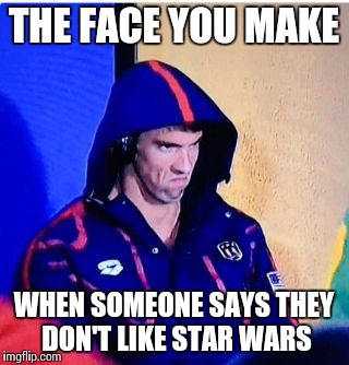 Star Wars Haters Get the Death Stare | THE FACE YOU MAKE; WHEN SOMEONE SAYS THEY DON'T LIKE STAR WARS | image tagged in michael phelps death stare,star wars | made w/ Imgflip meme maker