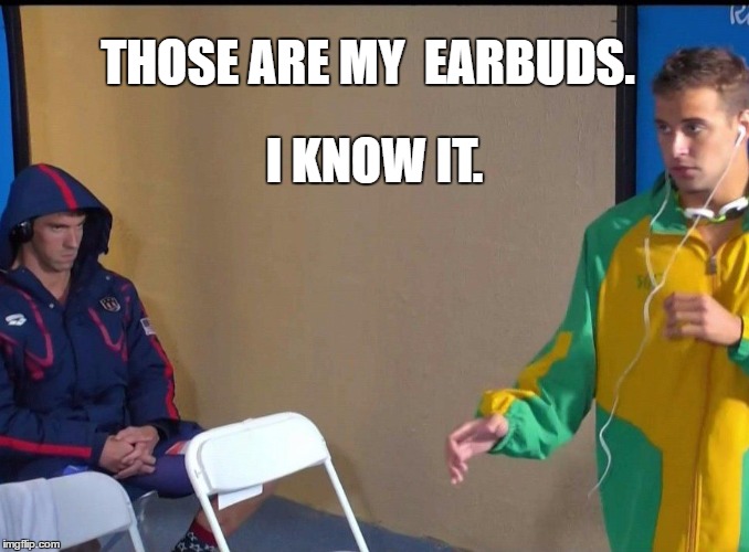 Angry Phelps Still Angry | THOSE ARE MY  EARBUDS. I KNOW IT. | image tagged in angry phelps,phelps face | made w/ Imgflip meme maker
