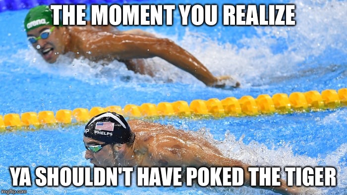Michael Phelps | THE MOMENT YOU REALIZE; YA SHOULDN'T HAVE POKED THE TIGER | image tagged in michael phelps | made w/ Imgflip meme maker