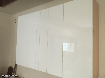 Cabinets in the Showroom | image tagged in gifs,hawaii,cabinets,pullouts,kitchen,high gloss | made w/ Imgflip images-to-gif maker