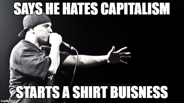 Immortal Technique | SAYS HE HATES CAPITALISM; STARTS A SHIRT BUISNESS | image tagged in immortal technique | made w/ Imgflip meme maker