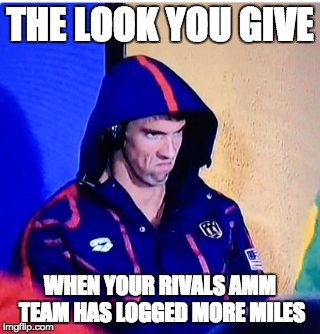 Michael Phelps Death Stare | THE LOOK YOU GIVE; WHEN YOUR RIVALS AMM TEAM HAS LOGGED MORE MILES | image tagged in michael phelps death stare | made w/ Imgflip meme maker