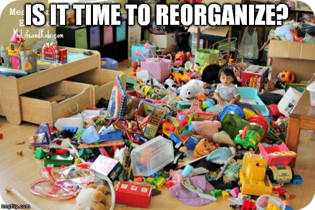 kid in messy room | IS IT TIME TO REORGANIZE? | image tagged in kid in messy room | made w/ Imgflip meme maker