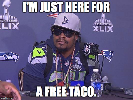 Marshawn Lynch | I'M JUST HERE FOR; A FREE TACO. | image tagged in marshawn lynch | made w/ Imgflip meme maker