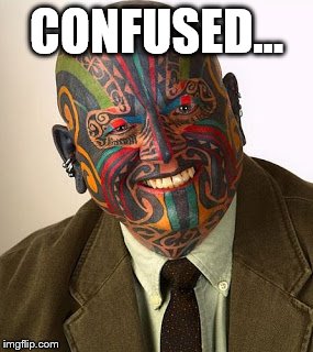 Tattoo man with suit | CONFUSED... | image tagged in tattoo guy,tattoo face,tattoo,suit | made w/ Imgflip meme maker