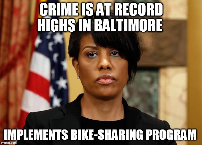 Stephanie Rawlings-Blake Is Incompetent  | CRIME IS AT RECORD HIGHS IN BALTIMORE; IMPLEMENTS BIKE-SHARING PROGRAM | image tagged in clueless stephanie,baltimore riots,mayor,crime,bike | made w/ Imgflip meme maker