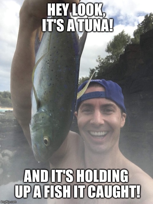 Chicken of the sea | HEY LOOK, IT'S A TUNA! AND IT'S HOLDING UP A FISH IT CAUGHT! | image tagged in tuna,fish,fishing,parks and recreation,gay terrorist | made w/ Imgflip meme maker