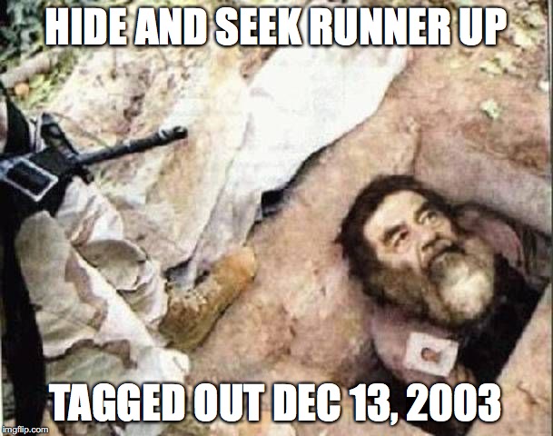 Sadam in a hole | HIDE AND SEEK RUNNER UP TAGGED OUT DEC 13, 2003 | image tagged in sadam in a hole | made w/ Imgflip meme maker