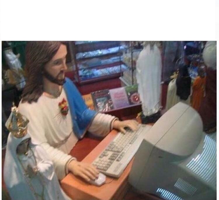 Jesus at the computer Blank Meme Template