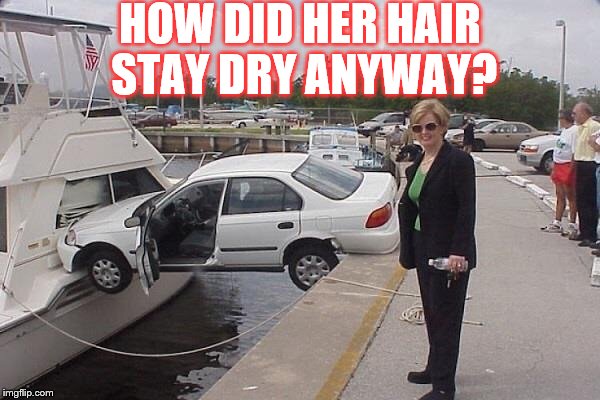 Woman driver |  HOW DID HER HAIR STAY DRY ANYWAY? | image tagged in women  texting,memes,meme,stayed dry anyway | made w/ Imgflip meme maker