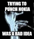 Chuck Norris Aftermath | TRYING TO PUNCH NOKIA; WAS A BAD IDEA | image tagged in chuck norris aftermath | made w/ Imgflip meme maker