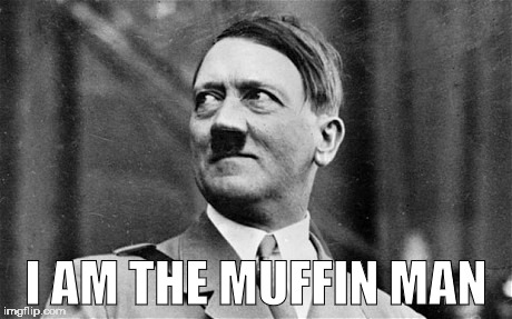 Hitler looking up and right and smiling | I AM THE MUFFIN MAN | image tagged in hitler looking up and right and smiling | made w/ Imgflip meme maker