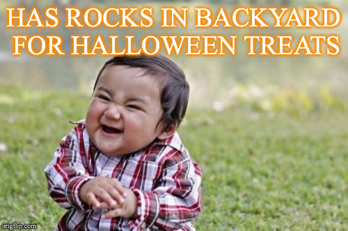 Evil Toddler | HAS ROCKS IN BACKYARD FOR HALLOWEEN TREATS | image tagged in memes,evil toddler | made w/ Imgflip meme maker