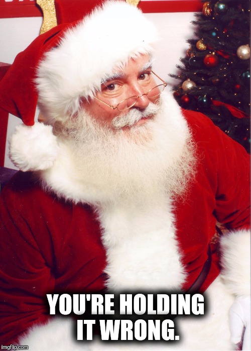 YOU'RE HOLDING IT WRONG. | made w/ Imgflip meme maker