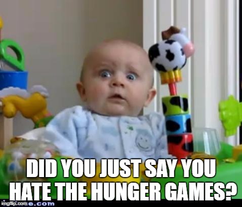 surprised baby |  DID YOU JUST SAY YOU HATE THE HUNGER GAMES? | image tagged in surprised baby | made w/ Imgflip meme maker