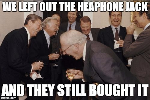 Laughing Men In Suits Meme | WE LEFT OUT THE HEAPHONE JACK; AND THEY STILL BOUGHT IT | image tagged in memes,laughing men in suits | made w/ Imgflip meme maker