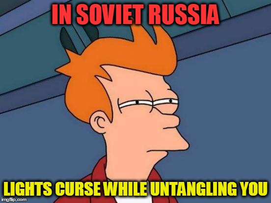 Futurama Fry Meme | IN SOVIET RUSSIA LIGHTS CURSE WHILE UNTANGLING YOU | image tagged in memes,futurama fry | made w/ Imgflip meme maker