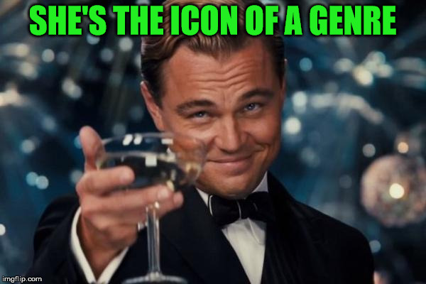 Leonardo Dicaprio Cheers Meme | SHE'S THE ICON OF A GENRE | image tagged in memes,leonardo dicaprio cheers | made w/ Imgflip meme maker