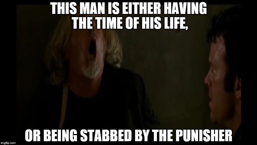 THIS MAN IS EITHER HAVING THE TIME OF HIS LIFE, OR BEING STABBED BY THE PUNISHER | image tagged in the punisher stabbing | made w/ Imgflip meme maker