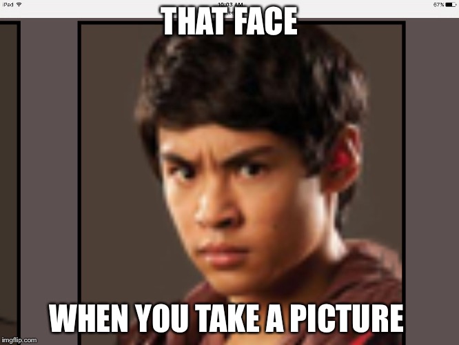 THAT FACE; WHEN YOU TAKE A PICTURE | image tagged in hunger games | made w/ Imgflip meme maker