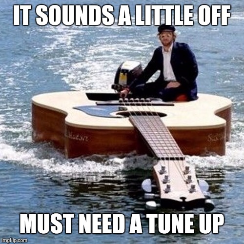 First boat to ever have both a captain and a capo | IT SOUNDS A LITTLE OFF; MUST NEED A TUNE UP | image tagged in strange boats,guitar boat | made w/ Imgflip meme maker