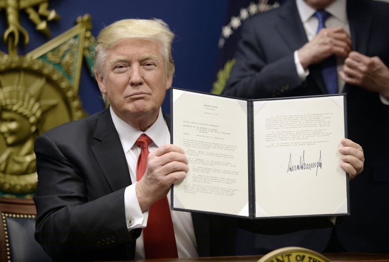 Trump signs ban Blank Meme Template