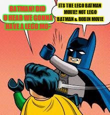 shut up robin!
 | BATMAN! DID U HEAR WE GONNA HAVE A LEGO MO-; ITS THE LEGO BATMAN MOVIE! NOT LEGO BATMAN & ROBIN MOVIE | image tagged in lego batman slapping robin,lego batman movie | made w/ Imgflip meme maker