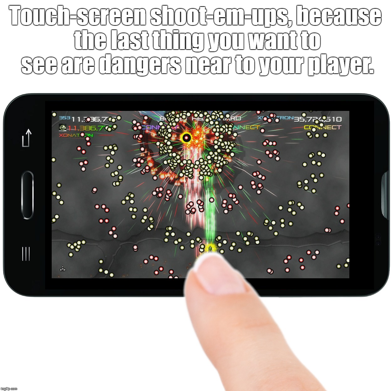 Touch-Screen Shoot-Em-Ups, Because The Last Thing You Want To See Are Dangers Near To Your Player. | Touch-screen shoot-em-ups, because the last thing you want to see are dangers near to your player. | image tagged in hand,held,smart,phone,touch,shoot | made w/ Imgflip meme maker