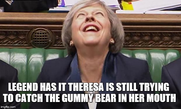 Theresa Memay | LEGEND HAS IT THERESA IS STILL TRYING TO CATCH THE GUMMY BEAR IN HER MOUTH | image tagged in theresa may,gummy bear,memes,funny memes,meme | made w/ Imgflip meme maker