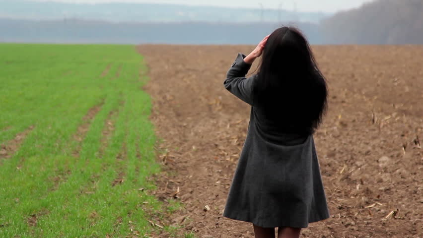 girl in a field looking thoughtfully into the distance Blank Meme Template