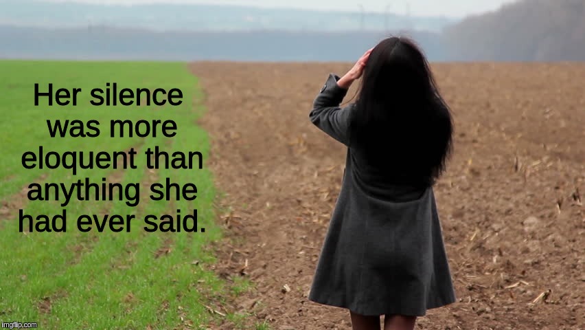 girl in a field looking thoughtfully into the distance | Her silence was more eloquent than anything she had ever said. | image tagged in girl in a field looking thoughtfully into the distance | made w/ Imgflip meme maker