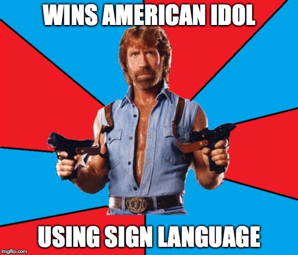 Chuck Norris With Guns | WINS AMERICAN IDOL; USING SIGN LANGUAGE | image tagged in memes,chuck norris with guns,chuck norris | made w/ Imgflip meme maker