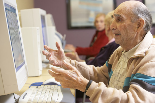 Old Man Looking At Computer Confused - digitalpictures