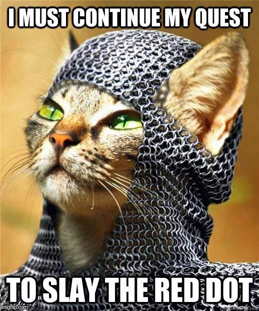 Sir Meowsalot | . | image tagged in cats,funny cats,red dot | made w/ Imgflip meme maker